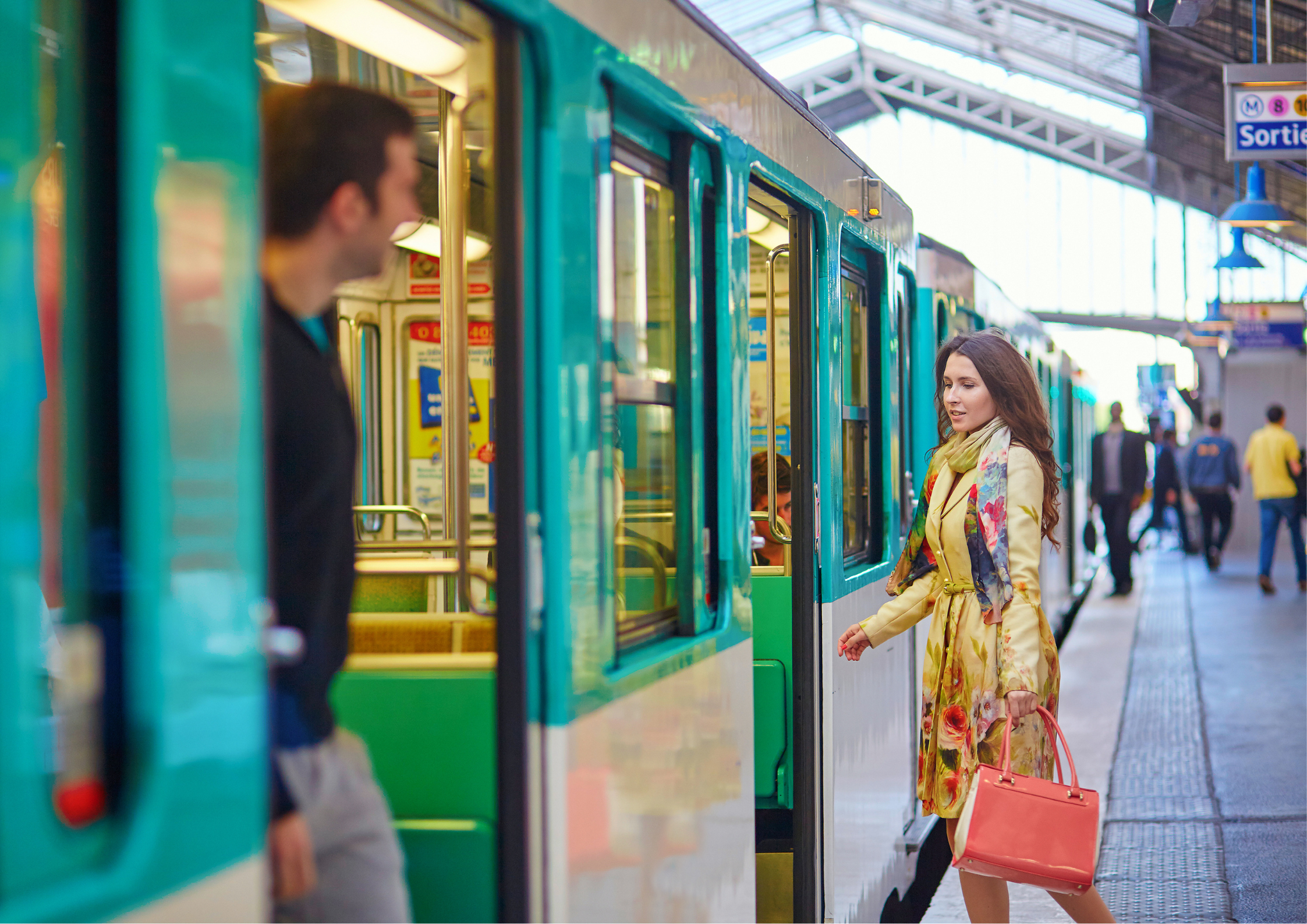 expat entering a train in Paris 