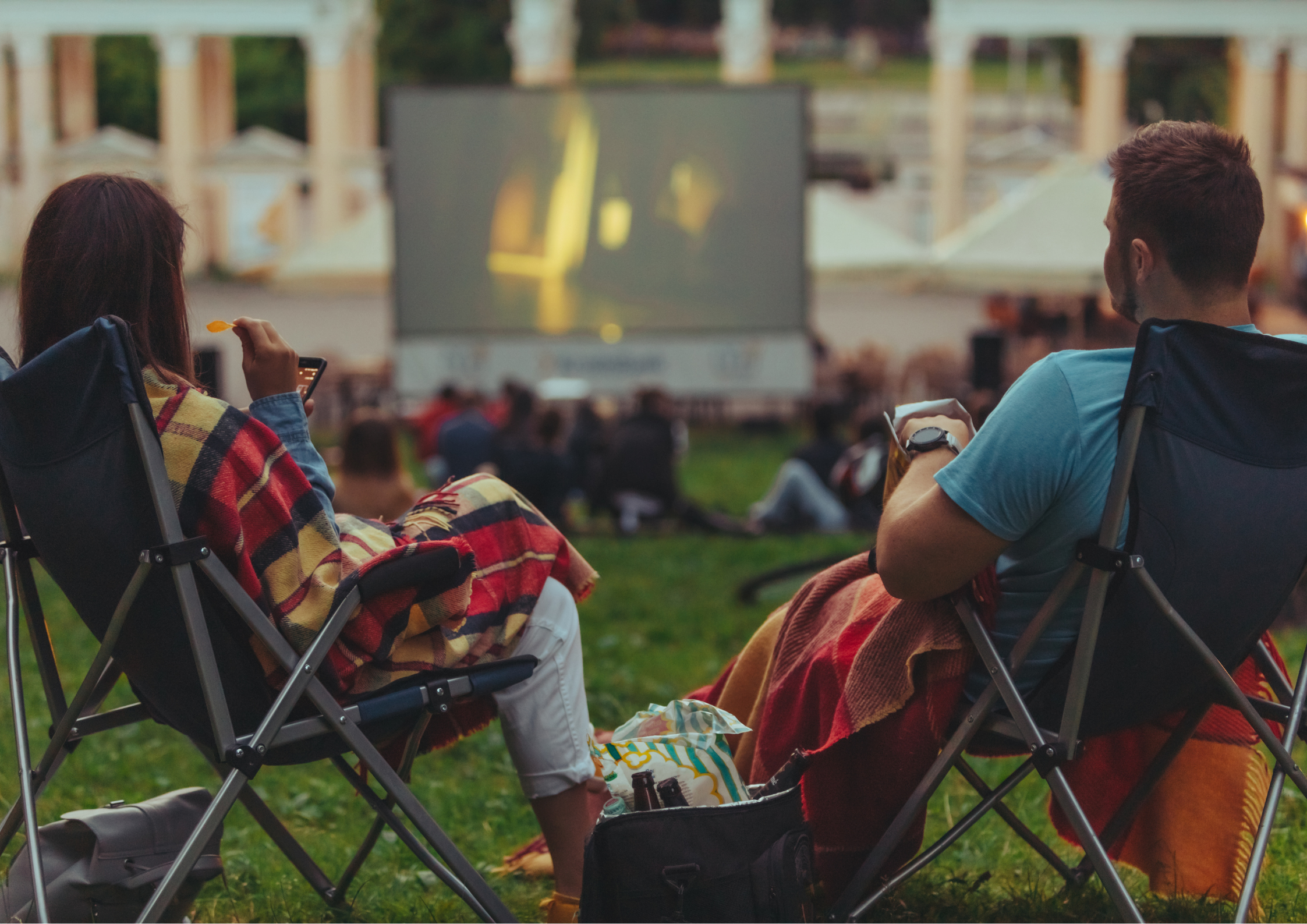 Expats enjoying an open air movie during the summer