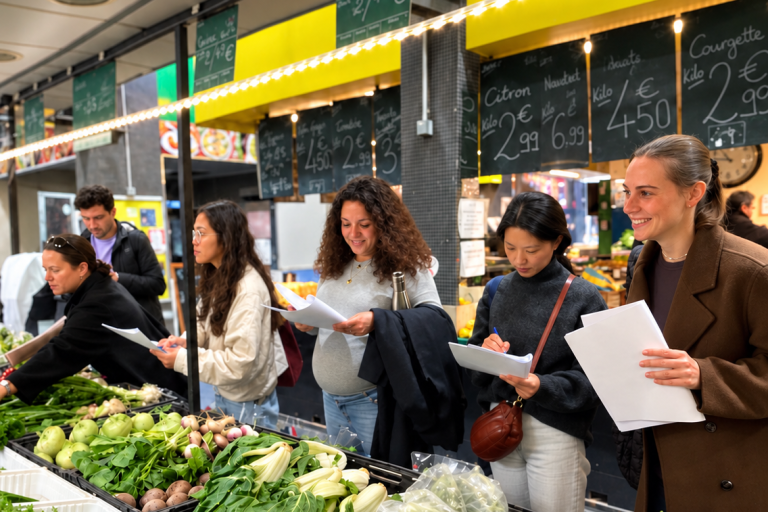 A group of expats exploring a Paris market